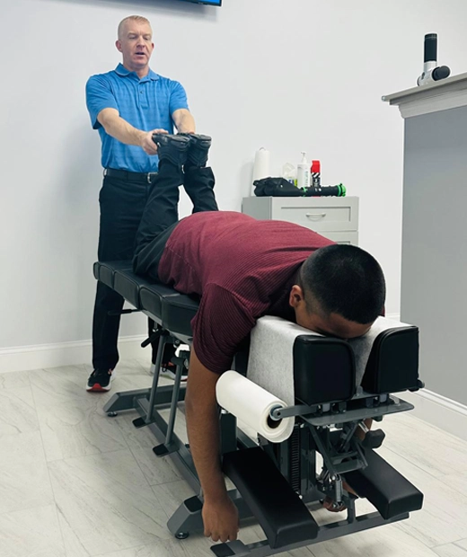 Chiropractor Venice FL Chad Lieser With Patient
